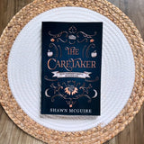 The Caretaker: A Cozy Paranormal Midlife Mystery by Shawn McGuire - Birdy's Bookstore